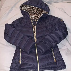 Black down jacket by Michael by Michael Kors with stylish leopard lining.
